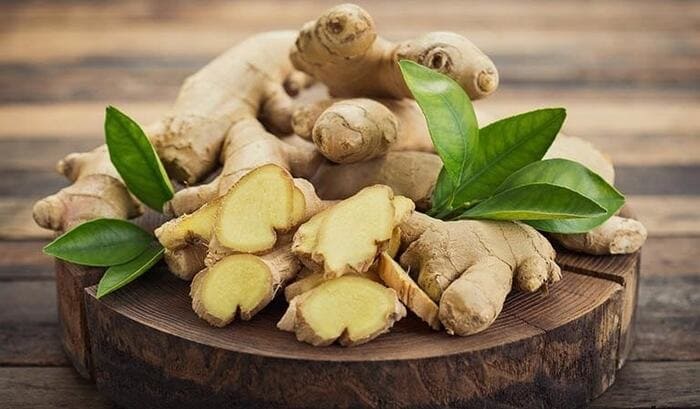 chữa tóc bạc sớm bằng dầu dừa gừng tươi